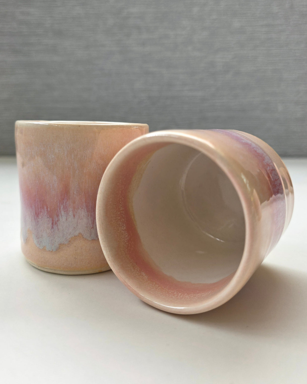 interior of handmade ceramic lungo cup with white interior and soft blush rim