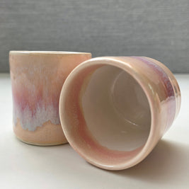 interior of handmade ceramic lungo cup with white interior and soft blush rim
