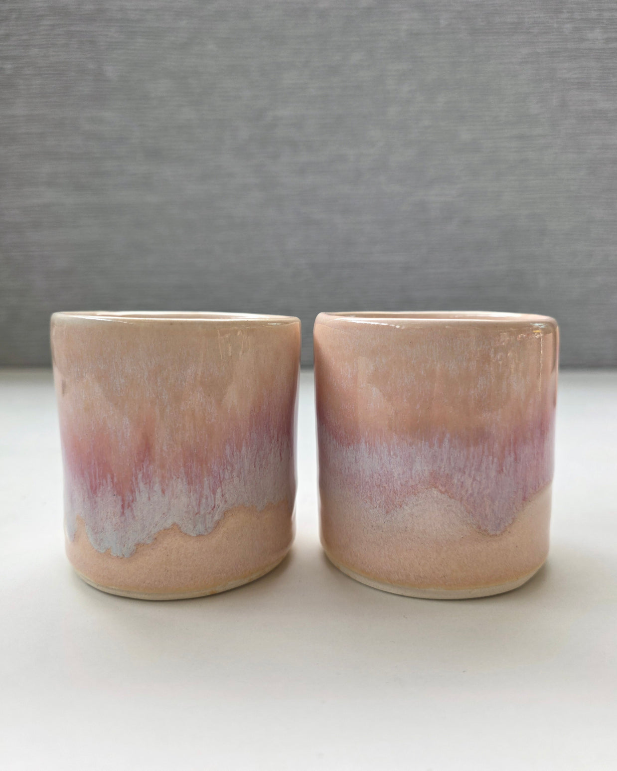 set of two handmade ceramic lungo cups with soft blush glaze