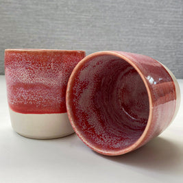 set of two handmade ceramic lungo cups with speckled berry interior