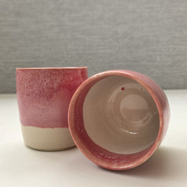 interior of handmade ceramic lungo cup with white glaze and slight pink glaze markings