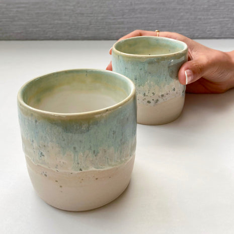 set of two handmade ceramic cups with seafoam green and blue glaze over a warm white-beige base (medium size)